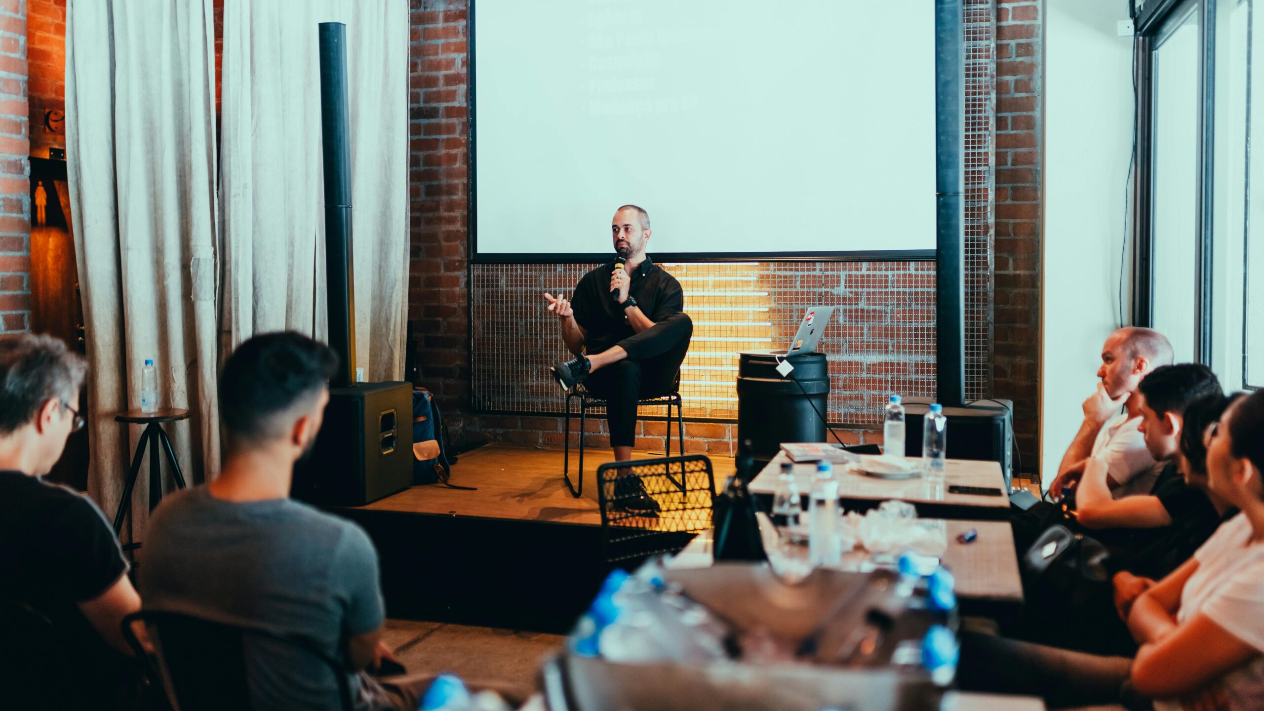 Man giving a presentation to a crowd